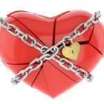 A broken heart held together by chains